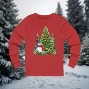 Long-sleeve shirt featuring a festive design with a snowman, Christmas trees adorned with colorful lights, and holly berries.