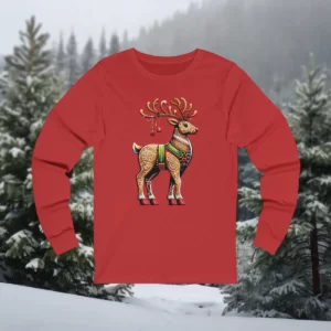 Long-sleeve shirt featuring a decorative reindeer design with intricate patterns and holiday accents, displayed against a snowy forest backdrop.