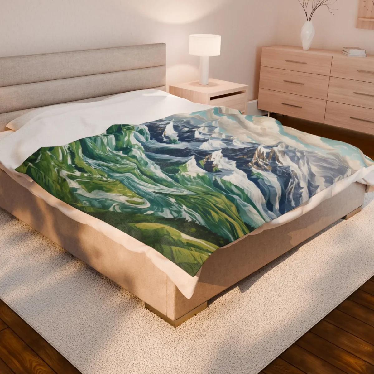 Velveteen plush blanket with alpine mountain scenery draped over a large bed