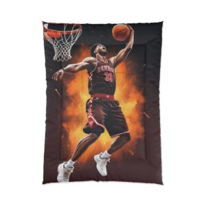 A Comforter featuring a dynamic design of a basketball player mid-air, about to dunk, with an intense fiery background.