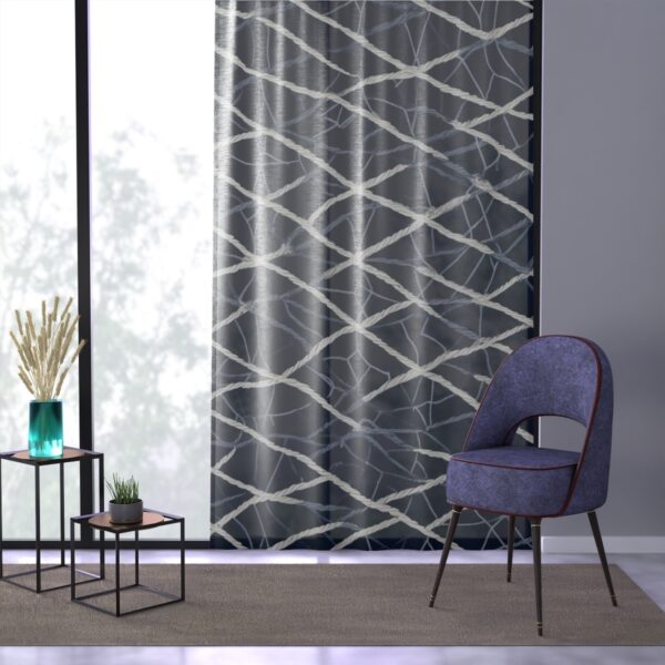 Sheer curtain with serene navy and white nautical net pattern