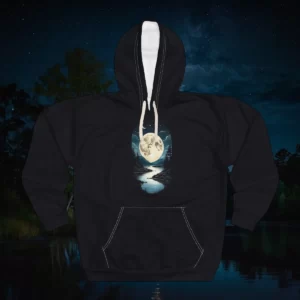 Hoodie with a moonlit forest and river design under a night sky.