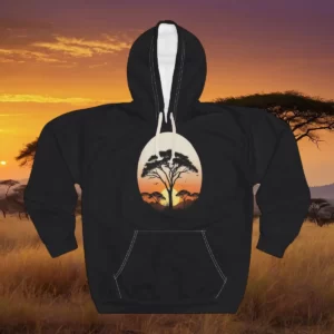 A hoodie featuring a savanna sunset design with acacia trees silhouetted against a vibrant sky, displayed against an African savanna backdrop.