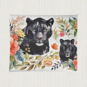 Flat view of a comforter with black panthers and colorful botanical design