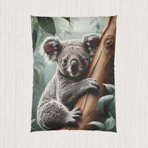 Flat view of a comforter with a realistic koala on a tree and eucalyptus leaves in the background