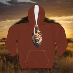 Hoodie with a bold lion graphic displayed against a sunset savanna background with acacia trees.