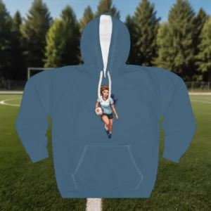 A hoodie featuring a soccer-themed design with a female soccer player in action, holding a soccer ball, set against a soccer field background.