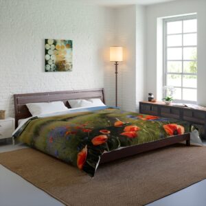 A bedroom featuring a Comforter with a design of poppies and wildflowers on a bed, in a bright space with a large window, wooden furniture, and a soft rug.