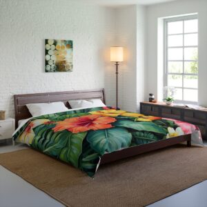 A Comforter featuring a vibrant tropical design with large hibiscus flowers in shades of orange, yellow, and pink, surrounded by lush green leaves.