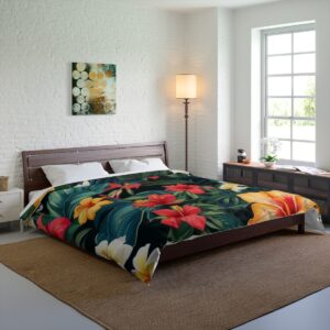 A Comforter featuring a vibrant tropical design with red, yellow, and white hibiscus flowers surrounded by lush green leaves.