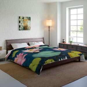 A Comforter featuring pink water lilies and lily pads floating on a serene pond.