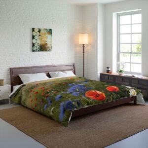 A bedroom featuring a Comforter with a design of poppies and wildflowers, placed on a bed in a bright room with large windows and wooden furniture.