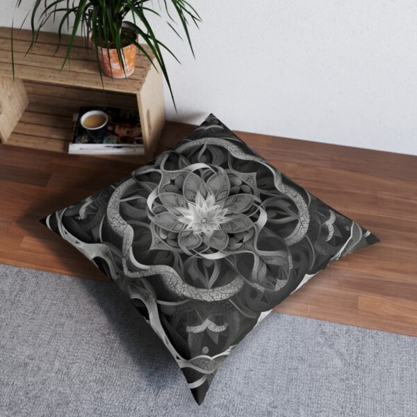 Captivating cushion cover with symmetrical geometric kaleidoscopic pattern in black and white