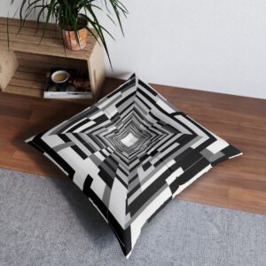 Artistic cushion with grayscale concentric rectangles creating optical tunnel illusion