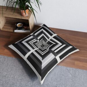 Contemporary cushion with concentric rectangles in black white and gray creating tunnel vision