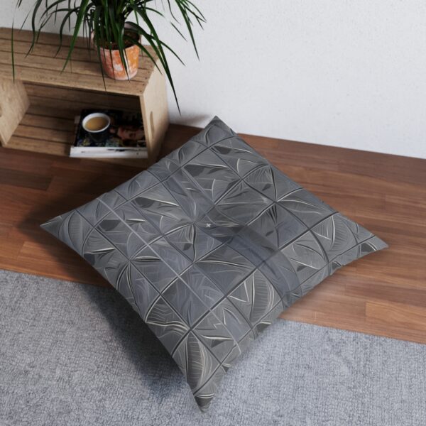 Artistic gray moiré pattern tufted floor pillow in contemporary room