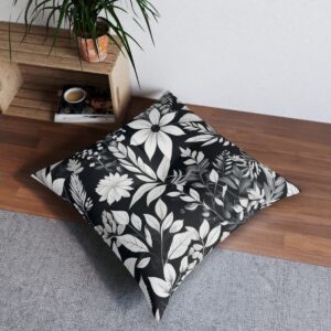 Sophisticated abstract monochrome foliage tufted floor pillow on wooden floor