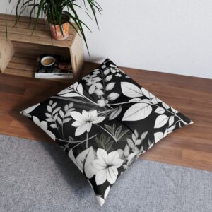 Modern abstract monochrome foliage tufted floor pillow in elegant setting