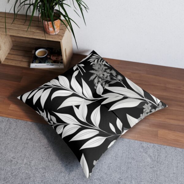 Elegant abstract monochrome foliage tufted floor pillow in home interior