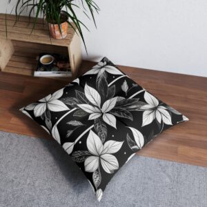 Monochrome foliage design tufted floor pillow in a modern setting