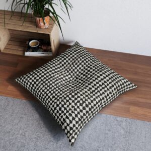 Contemporary houndstooth tufted floor pillow with black and white triangles