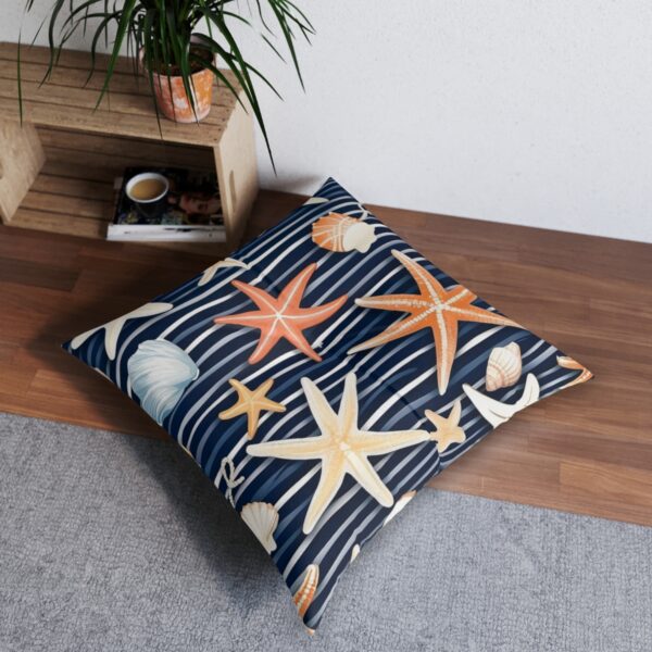 Plush elegance tufted floor pillow with starfish and seashells on navy and white stripes