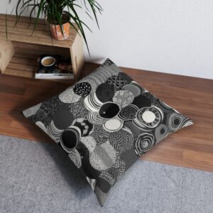 Chic tufted floor pillow with distinct monochrome patterned perfect circles