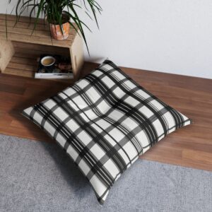 Classic tufted floor pillow with black and white vertical lines and grid pattern