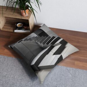 Striking tufted floor pillow with cascading staircase optical illusion in gray