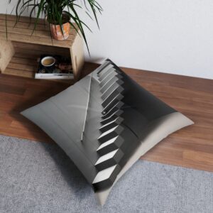 Tufted floor pillow with three-dimensional staircase illusion in shades of gray