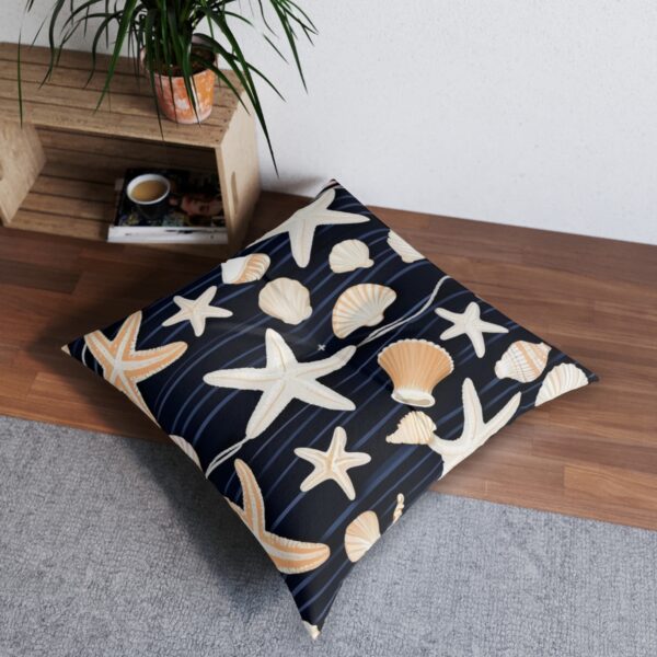 Coastal retreat tufted floor pillow with starfish and seashells design