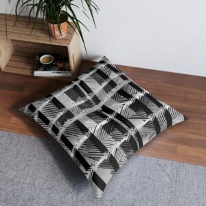 alternatif: Black and white geometric pattern tufted floor pillow on wooden floor