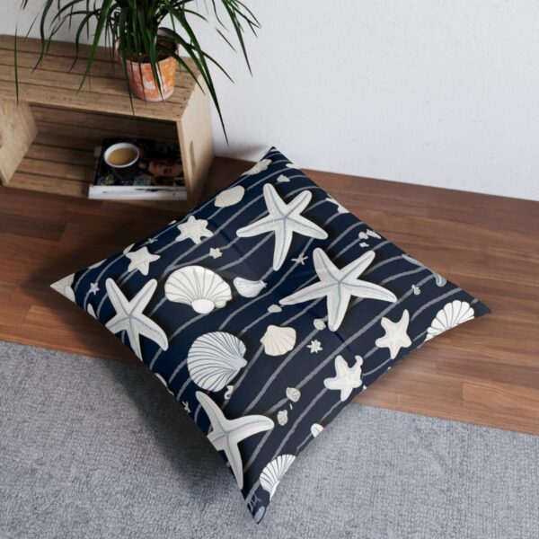 Coastal bliss tufted floor pillow with starfish and seashells on navy and white stripes