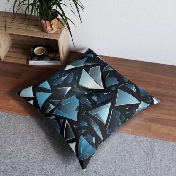 Tufted floor pillow with dynamic shattered glass design in monochrome