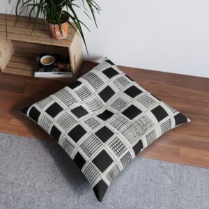 Architectural grid tufted floor pillow with precise black square array