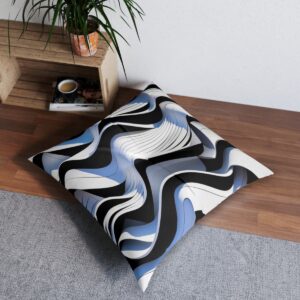 Curvilinear contrast tufted floor pillow with blue accents