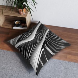 Sharp black and white lined tufted floor pillow with angular wave pattern