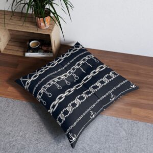 Bold nautical statement tufted floor pillow with gleaming anchor chains on dark blue stripes