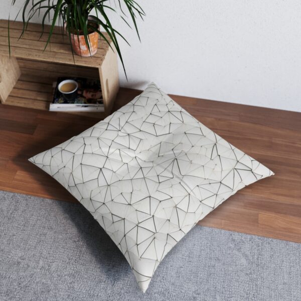 Crisp Polygonal Floor Pillow with interlocking lines on pristine white canvas