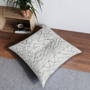 Tufted floor pillow with delicate polygonal line design on white background