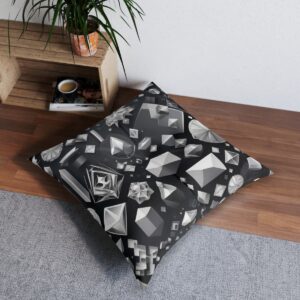 Tufted floor pillow with geometric grayscale motif