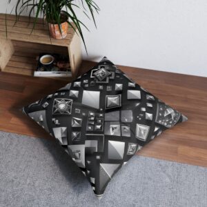 Tufted floor pillow with a collage of geometric shapes in grayscale