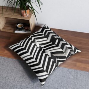 Black and white striped tufted floor pillow with bold graphic touch