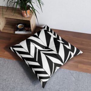 Tufted floor pillow with bold black and white chevron design