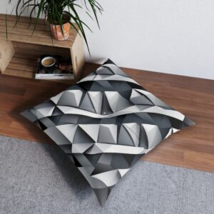 Modern tufted floor pillow with sophisticated interlocking triangles pattern