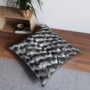 Geometric tufted floor pillow with an intricate interlocking triangles pattern