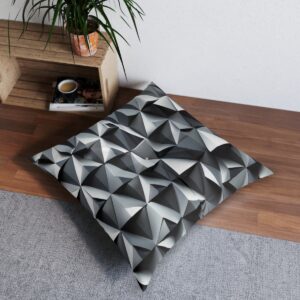 Chic tufted floor pillow with striking interlocking triangles pattern