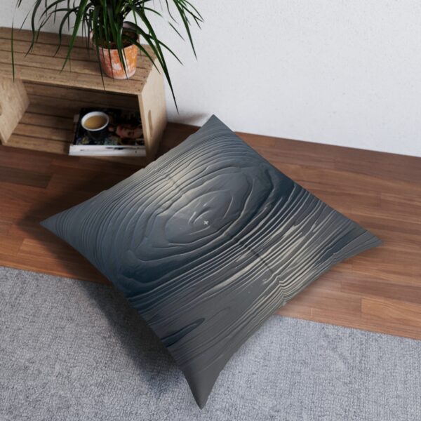 Lunar Gleam tufted floor pillow with reflective wood grain pattern