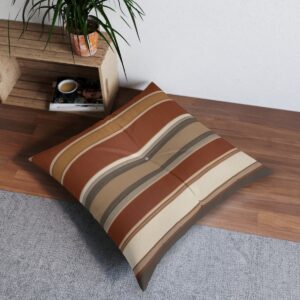 Modern striped tufted floor pillow in earth tones