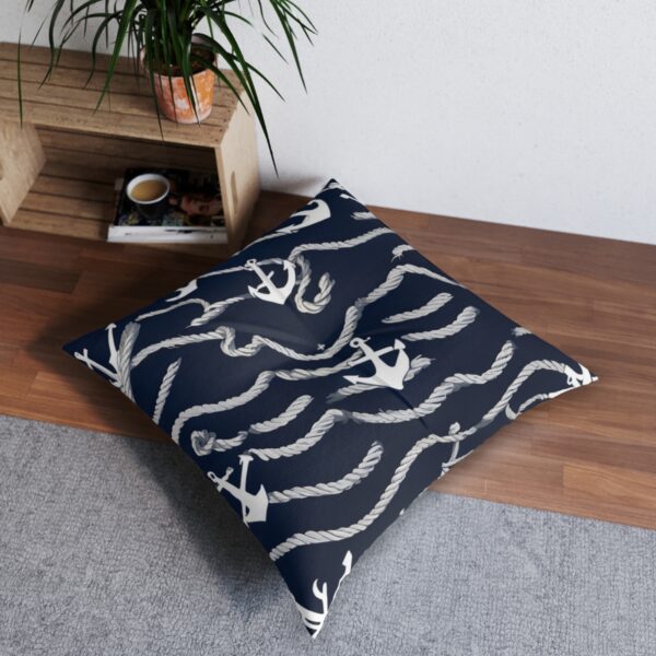 Maritime stripes tufted floor pillow with steady anchor and fluid sea ropes design